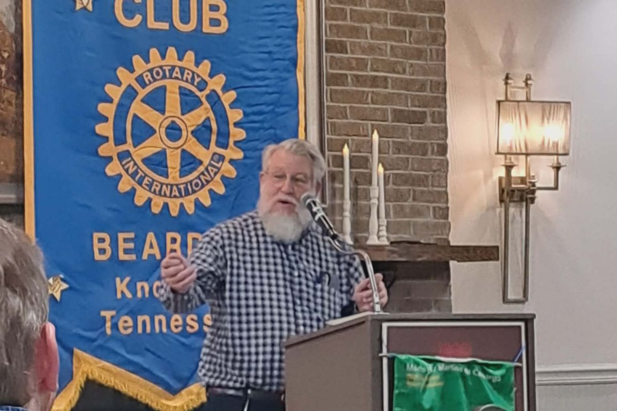 W. Jim Cortese speaking at a Rotary Club event before a garden club talk